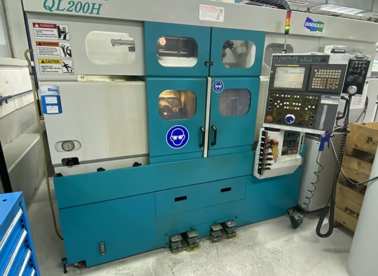 DOOSAN QL 200 H CNC lathe with automation